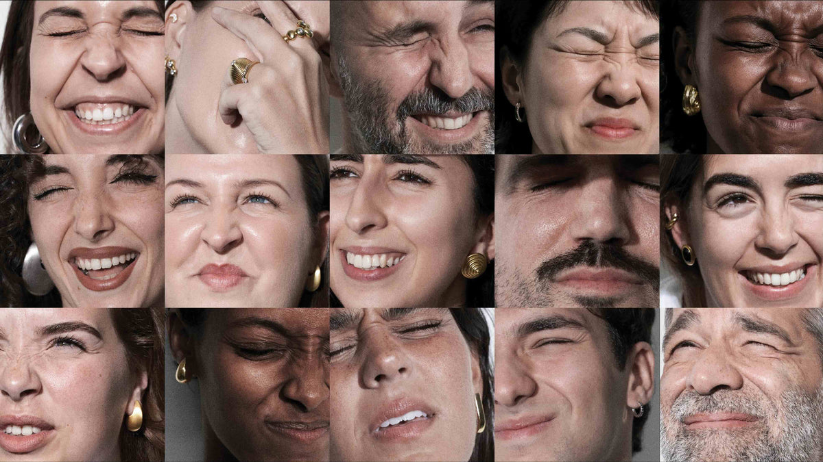 People expressing joy and emotion while wearing CINCO Jewelry, showcasing timeless jewelry that celebrates emotion.