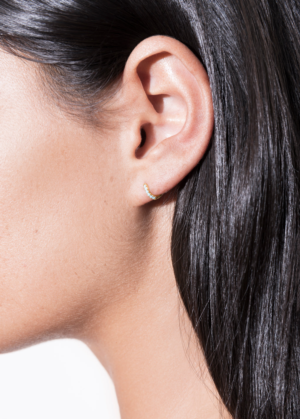 model wearing cate hoop 18k turquoise