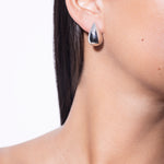 model wearing constantin earrings in silver