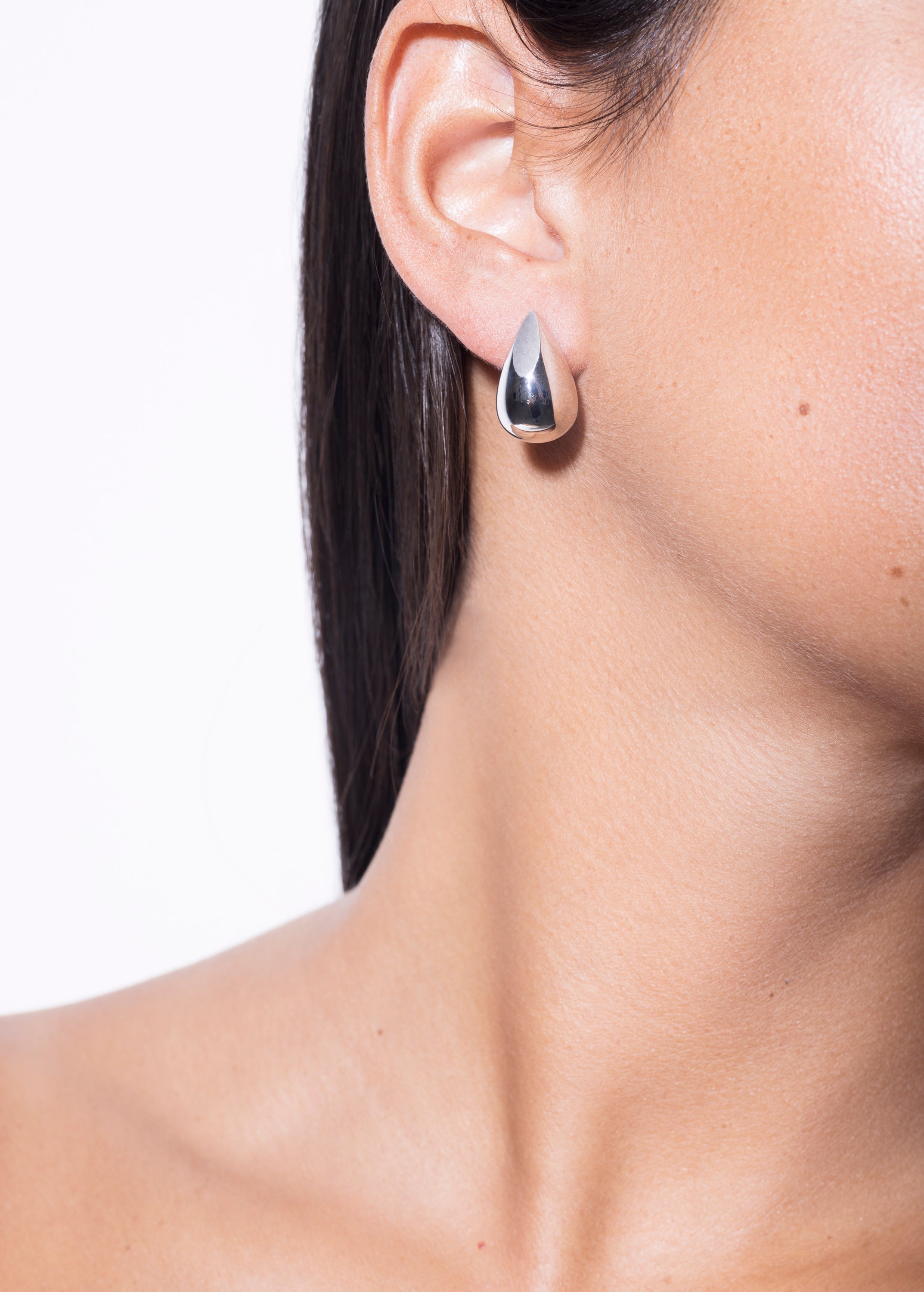 model wearing constantin earrings in silver