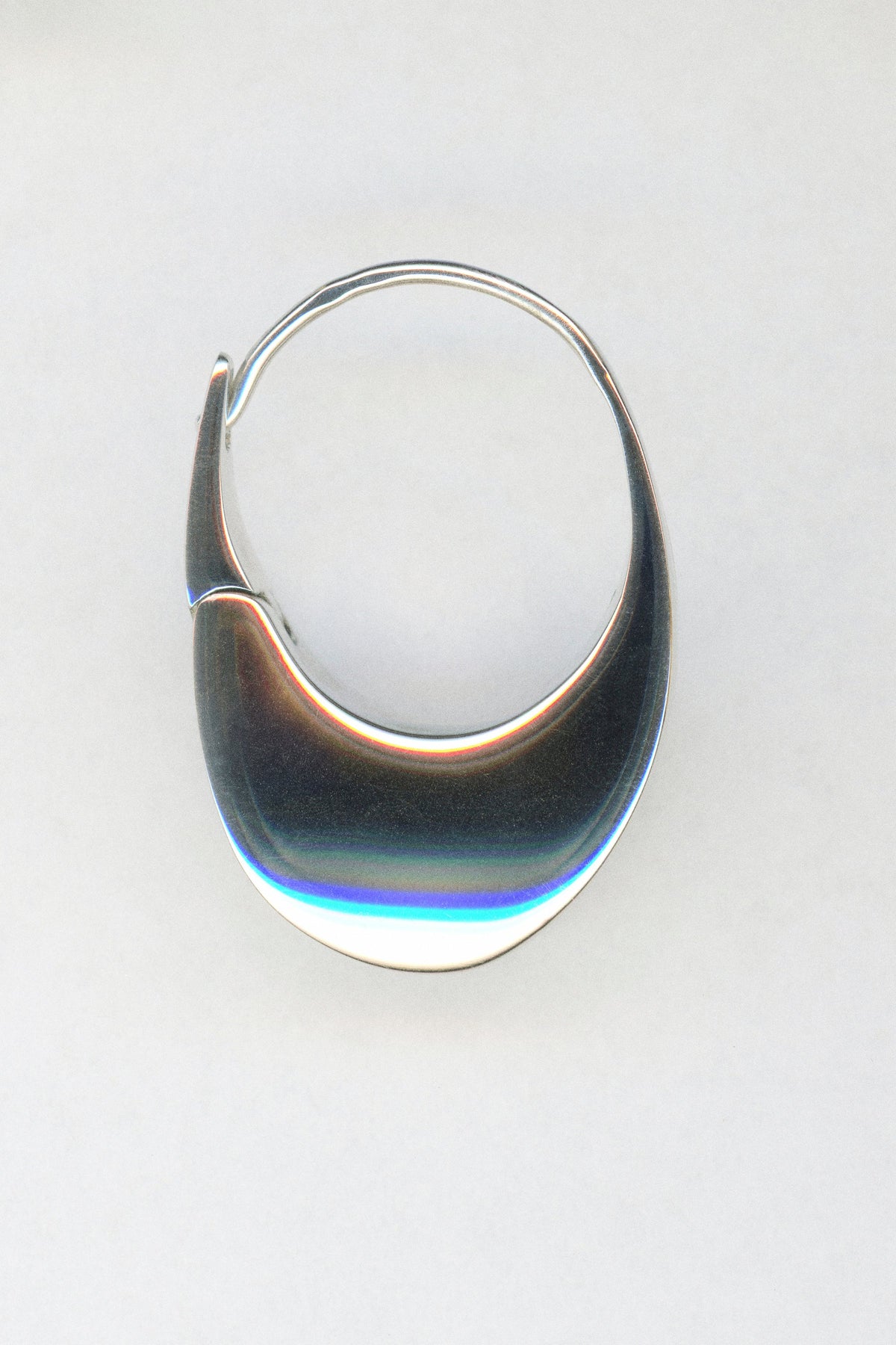 Handmade birthday jewelry gifts, featuring a sleek and modern bangle bracelet in sterling silver.