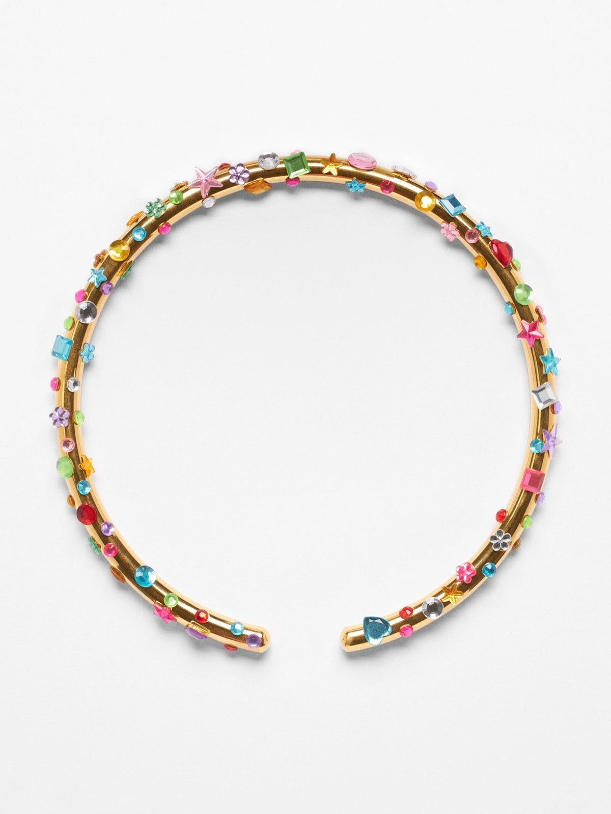 handmade silver and gold jewelry with colorful decorative gems and stars