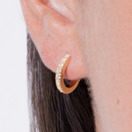 amina huggies white earrings