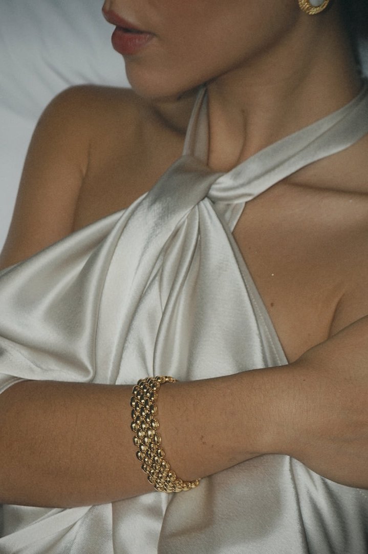 model wearing gala bracelet in gold